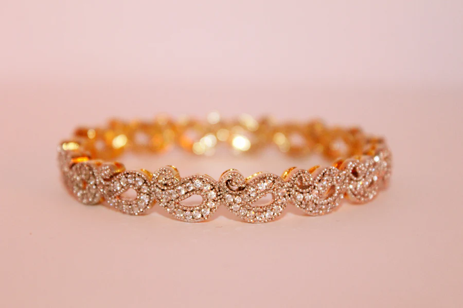 Gold jewelry arranged on a tray